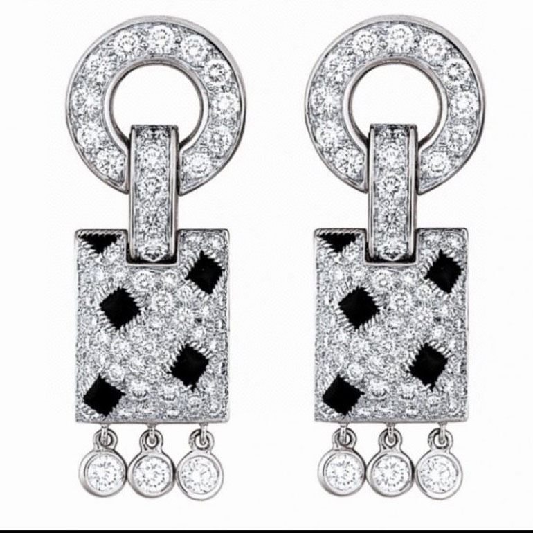 Ca*t*er earrings